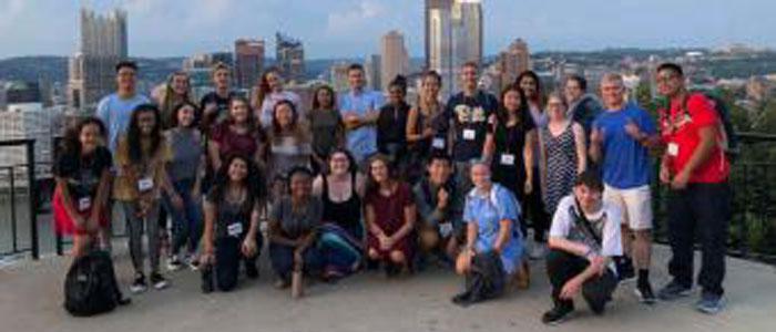 TRIO Student group in front of the Pittsburgh skyline